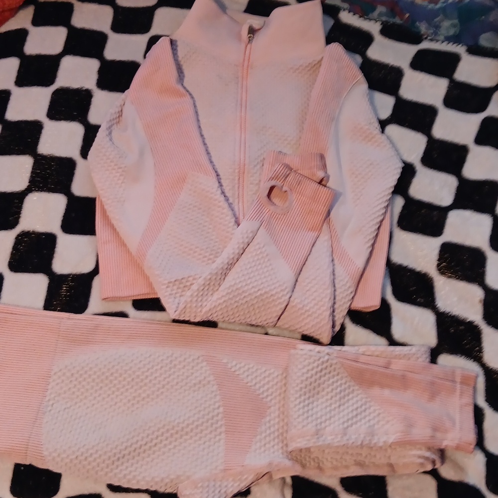 Two piece pink textured leggings and long sleeve shirt.